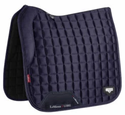 LeMieux Loire Memory Foam Dressage Pad 20 LeMieux Loire Memory Foam Dressage Pad -Weaver Leather Store loire drsg memory navy side 6361 lemieux 45135.1677098434